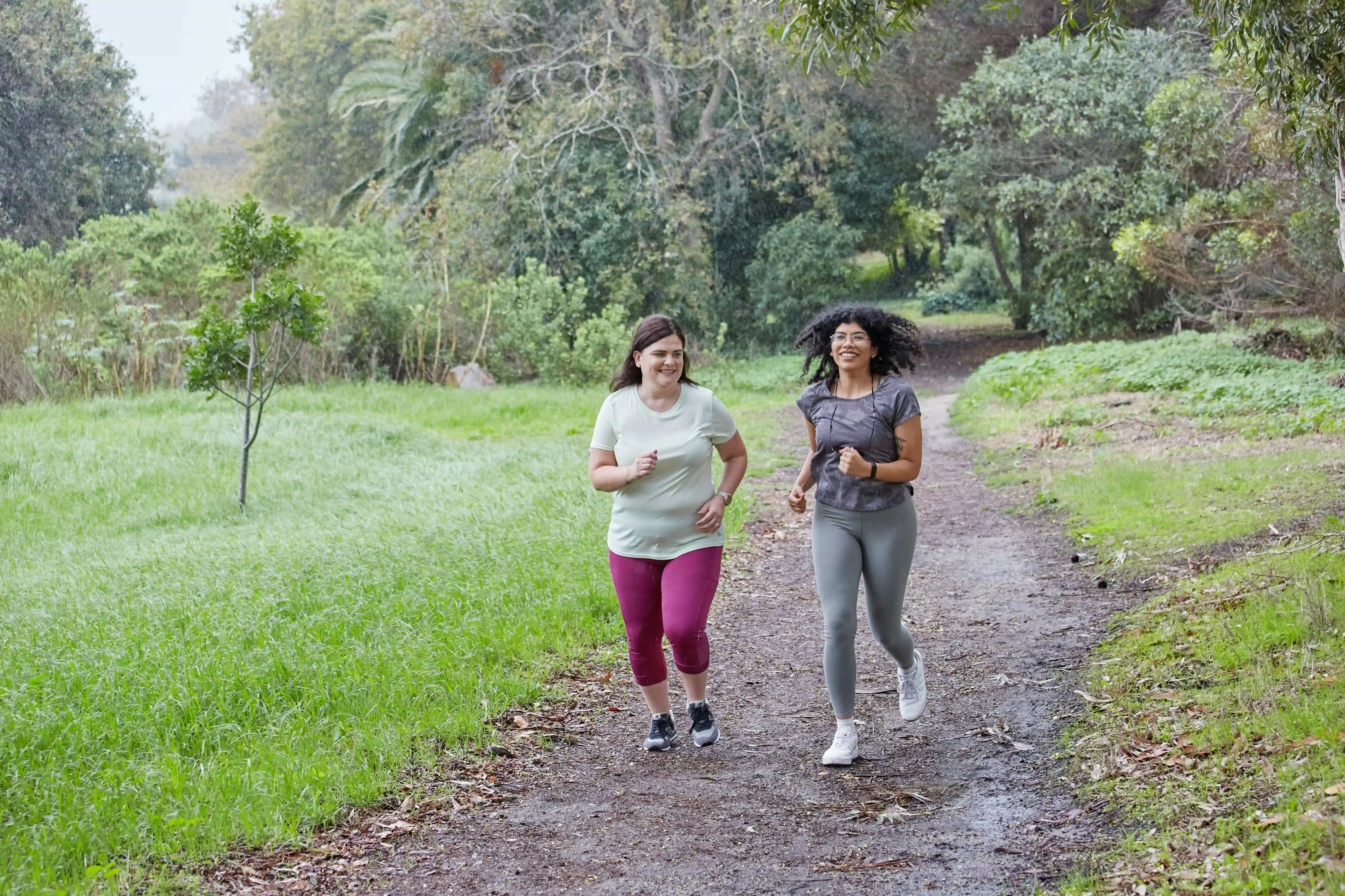 A picture showing 2 women jogging.
