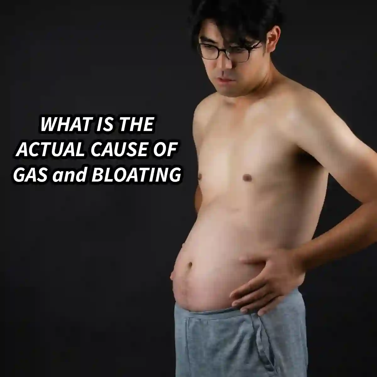 Person holding abdomen illustrating digestive discomfort and bloating