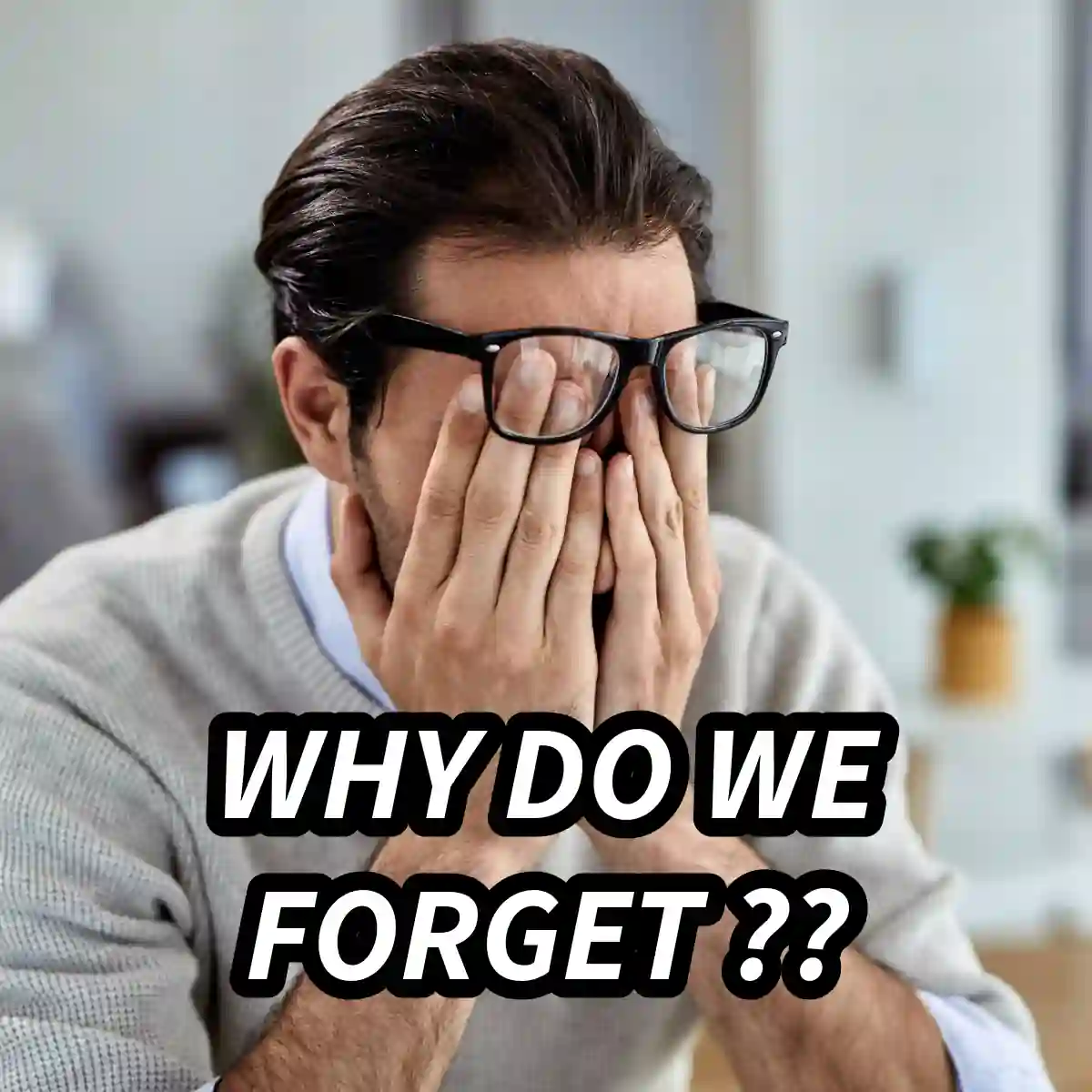 Man covering his face with his hands while struggling to remember something